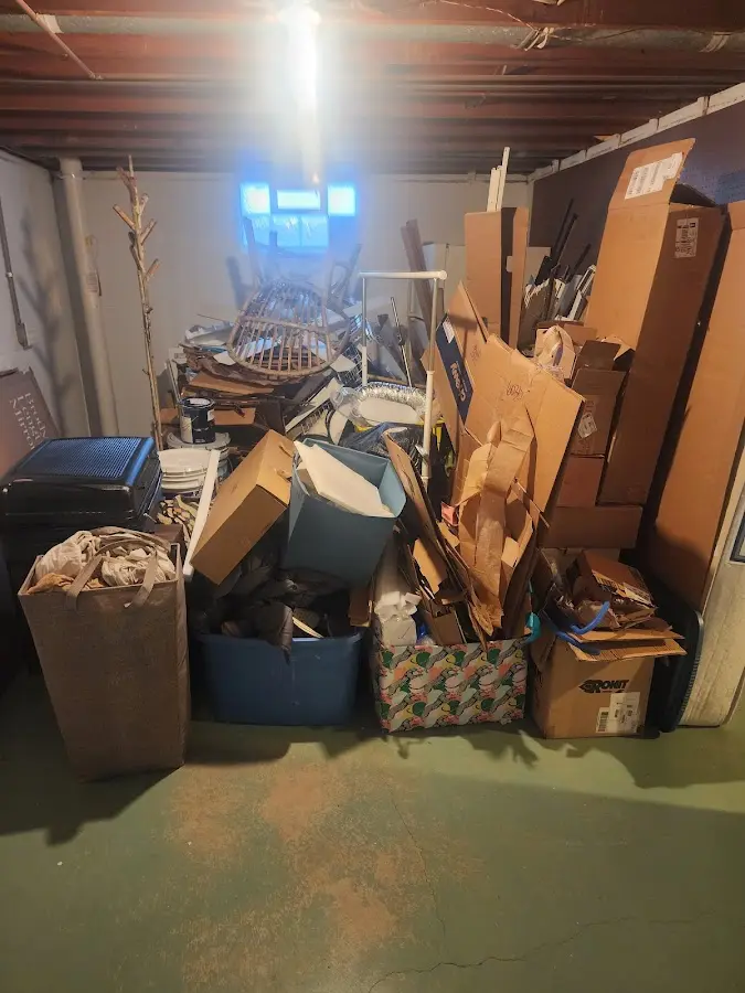 Roll-off dumpster container at job site for 4 Yard Dumpster Rental in Ellsworth